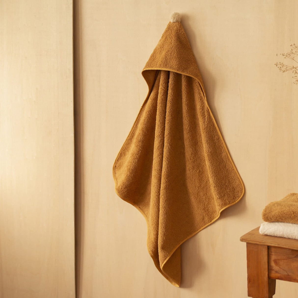 Cape de bain bébé pompon Caramel So Cute