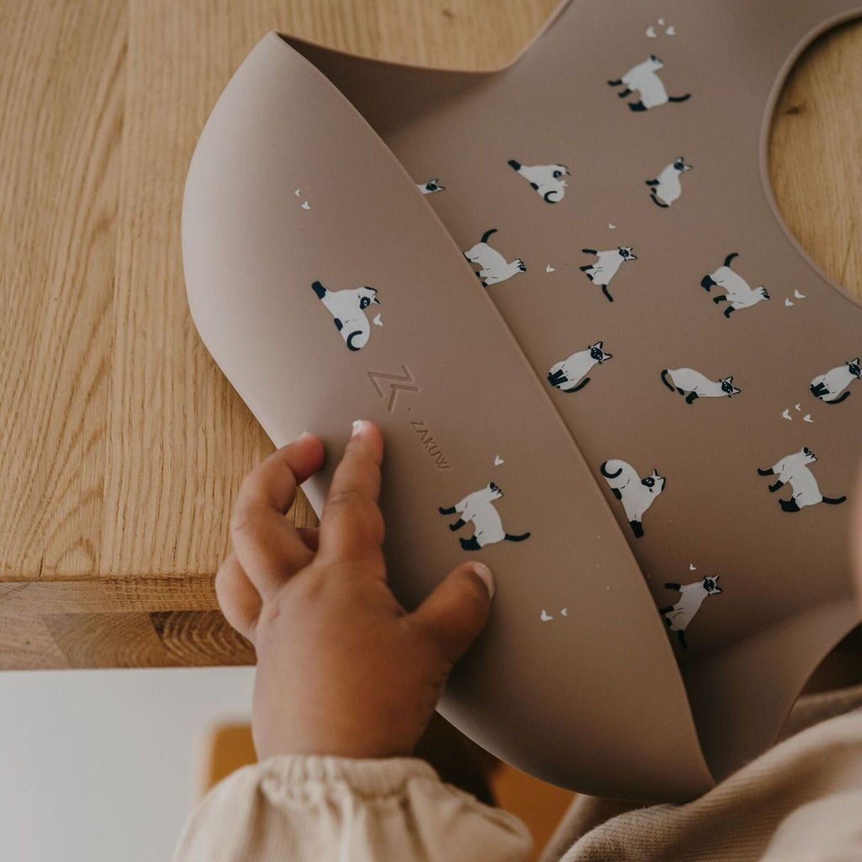 Bavoir silicone Minouche taupe