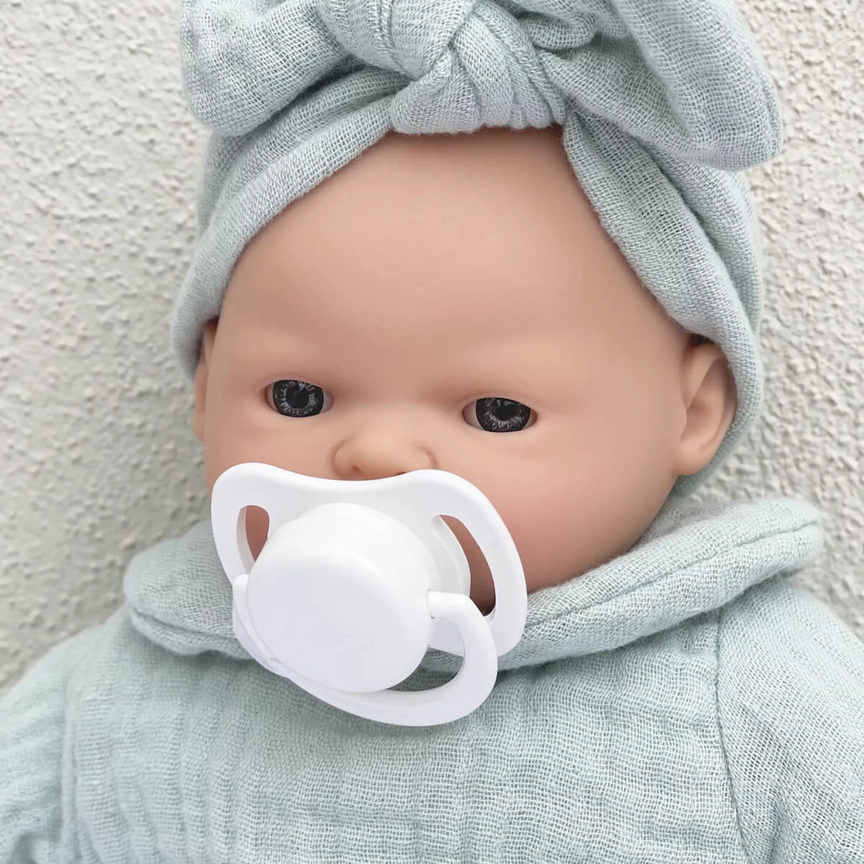 Petite poupée Nina 26 cm bleu