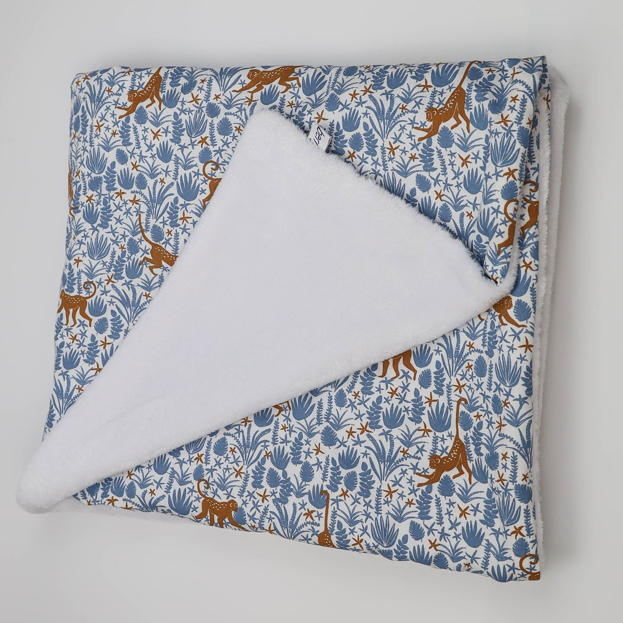 Couverture bleu petit singe