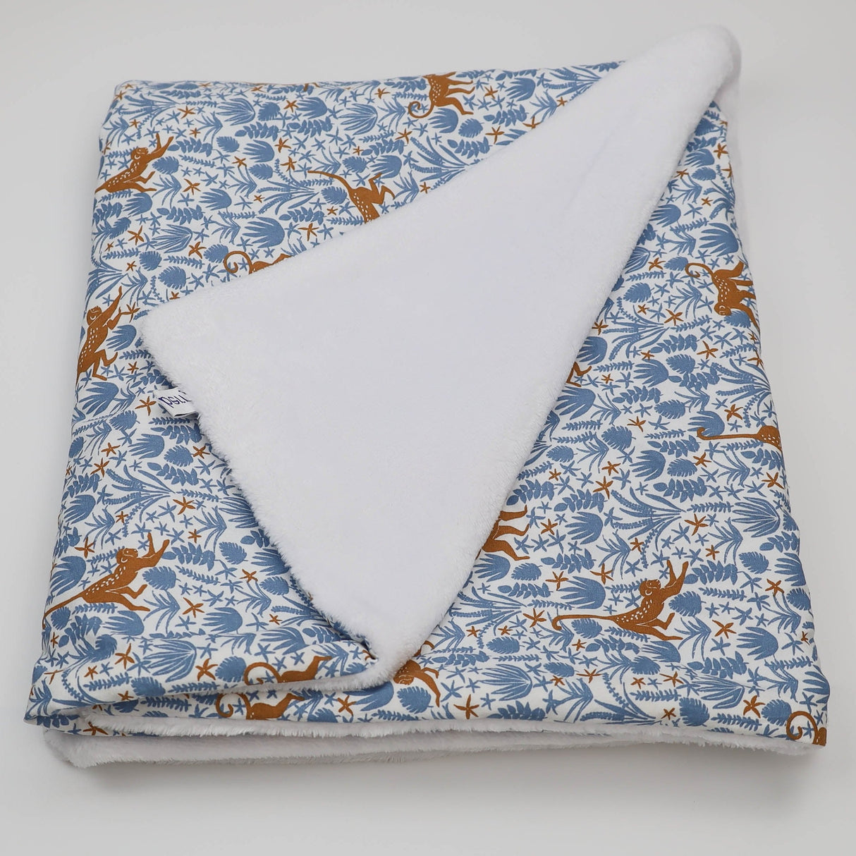 Couverture bleu petit singe