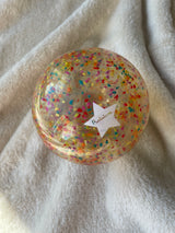 Balle de manipulation confetti multico 10 cm - Ratatam