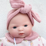 Petite poupée Nina 26 cm flowers rose