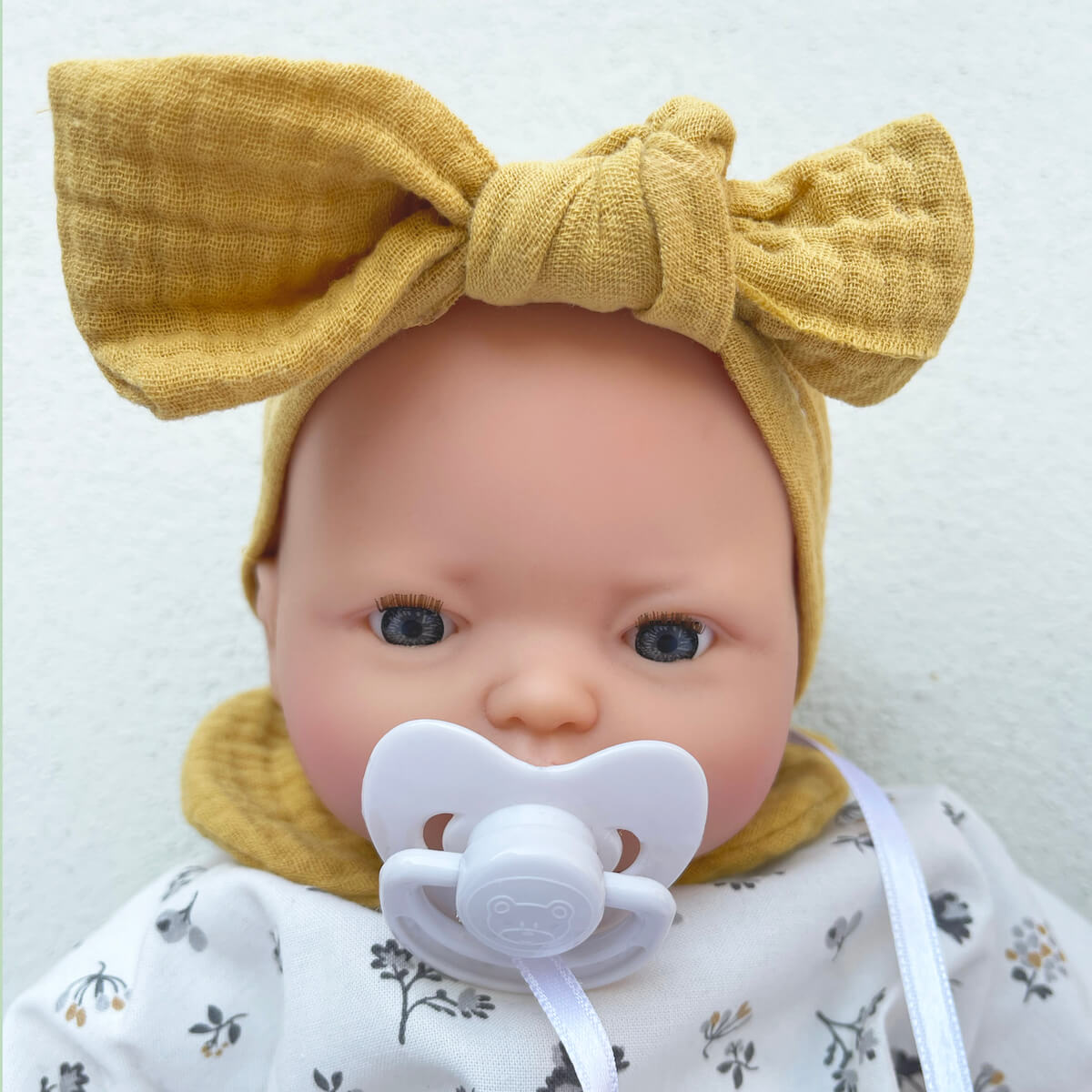 Porte bébé pour poupée motifs fleurs : Poupées
