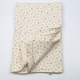 Couverture été bouton bleu