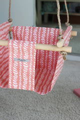 Balançoire intérieure feuilles rose