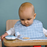 Bavoir carreaux bleus