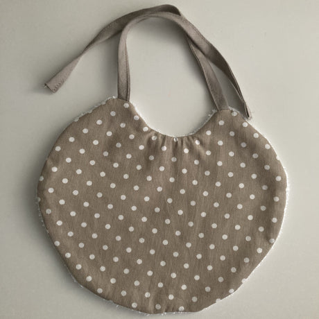 Bavoir taupe pois blanc